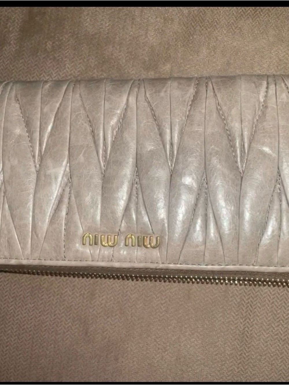 Miu Miu Quilted Zip Wallet in Light Gray with Gold Logo